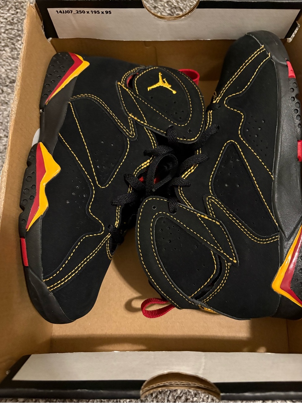 Jordan Kids Black Sneakers with Yellow & Red Accents